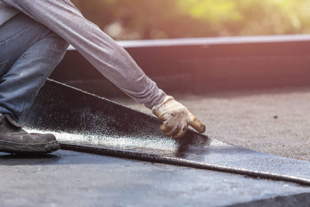 Professional Exterior Waterproofing technician working in Corning, NY